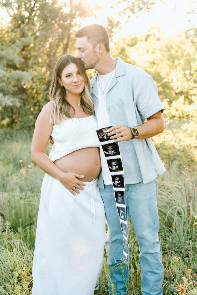 Pregnant couple maternity photos at Lake Grapevine by DFW maternity photographer