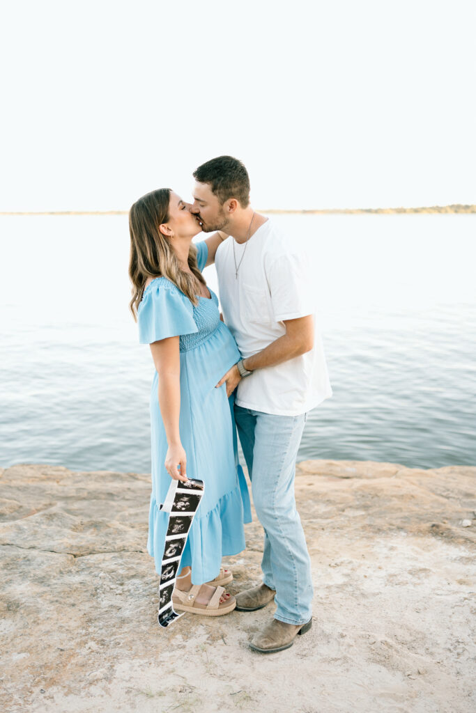 Baby boy announcement photo session with expecting parents in North Texas